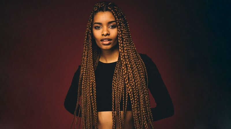 Brown Box braids are a timeless style because of their simplicity but abili...